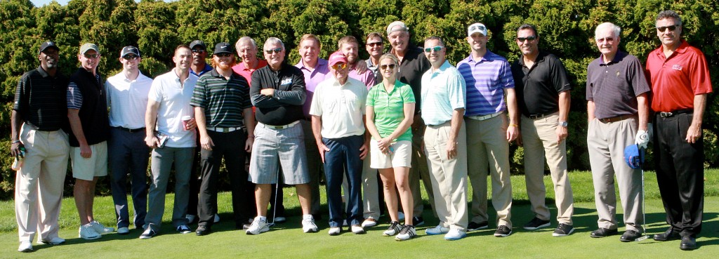 All of the 18 celebrity golfers from the 2013 event gathered with Tim for a team photo before the tee off.